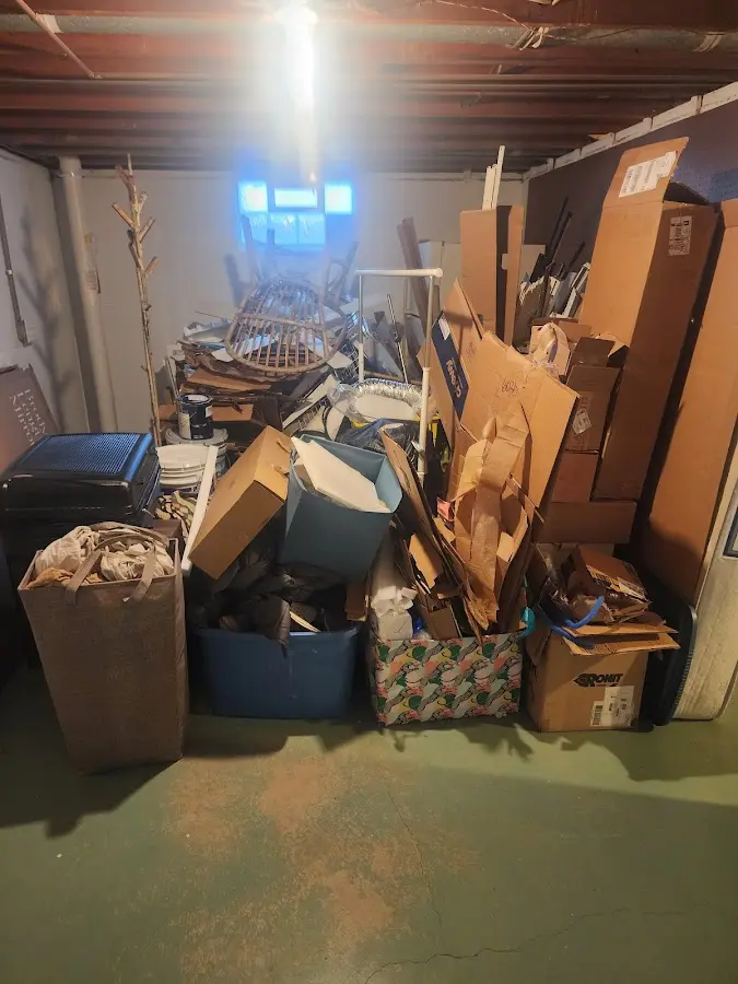 Roll-off dumpster container at job site for 2 Yard Dumpster Rental in Somers Point